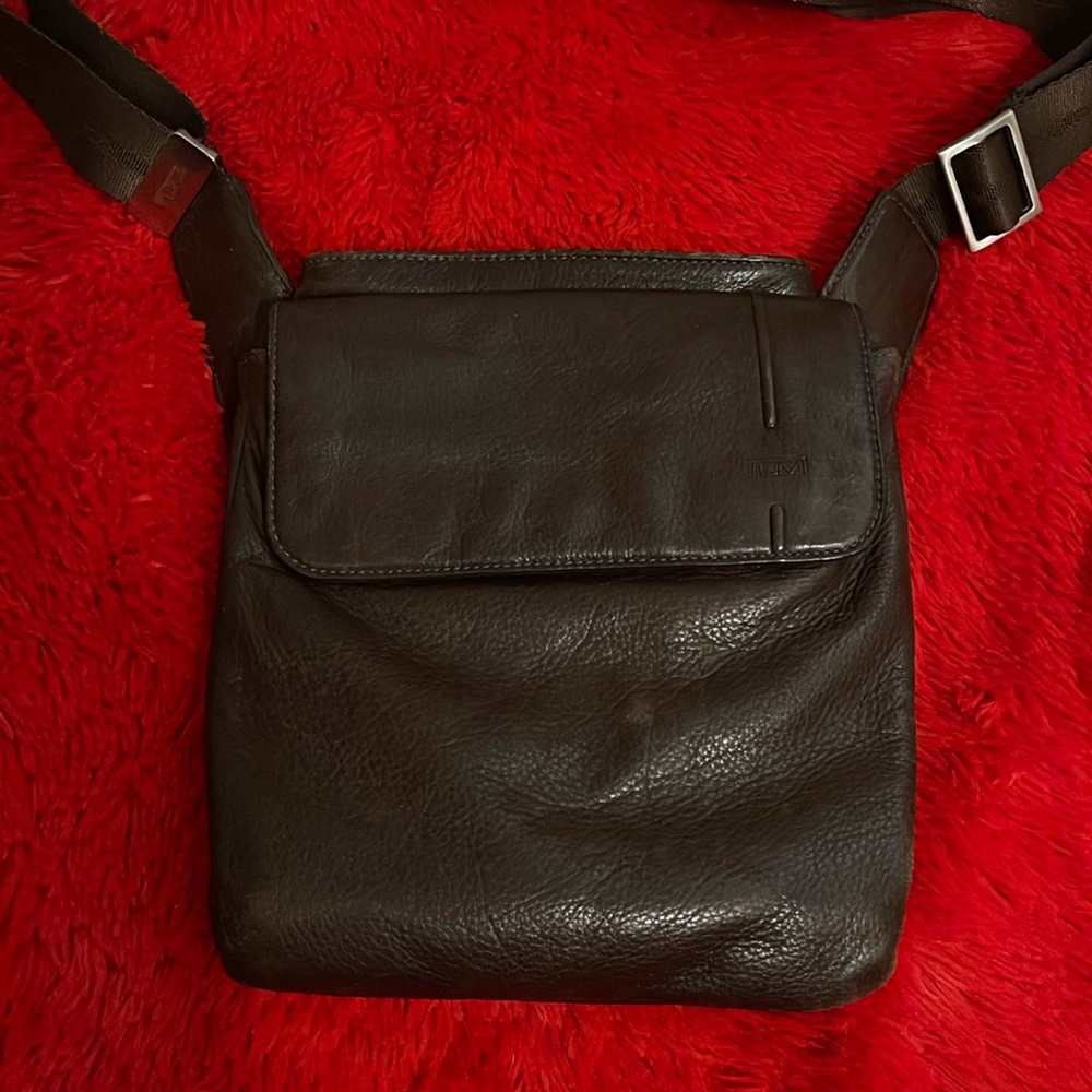 Small dark brown leather Tumi purse-model 69332bn